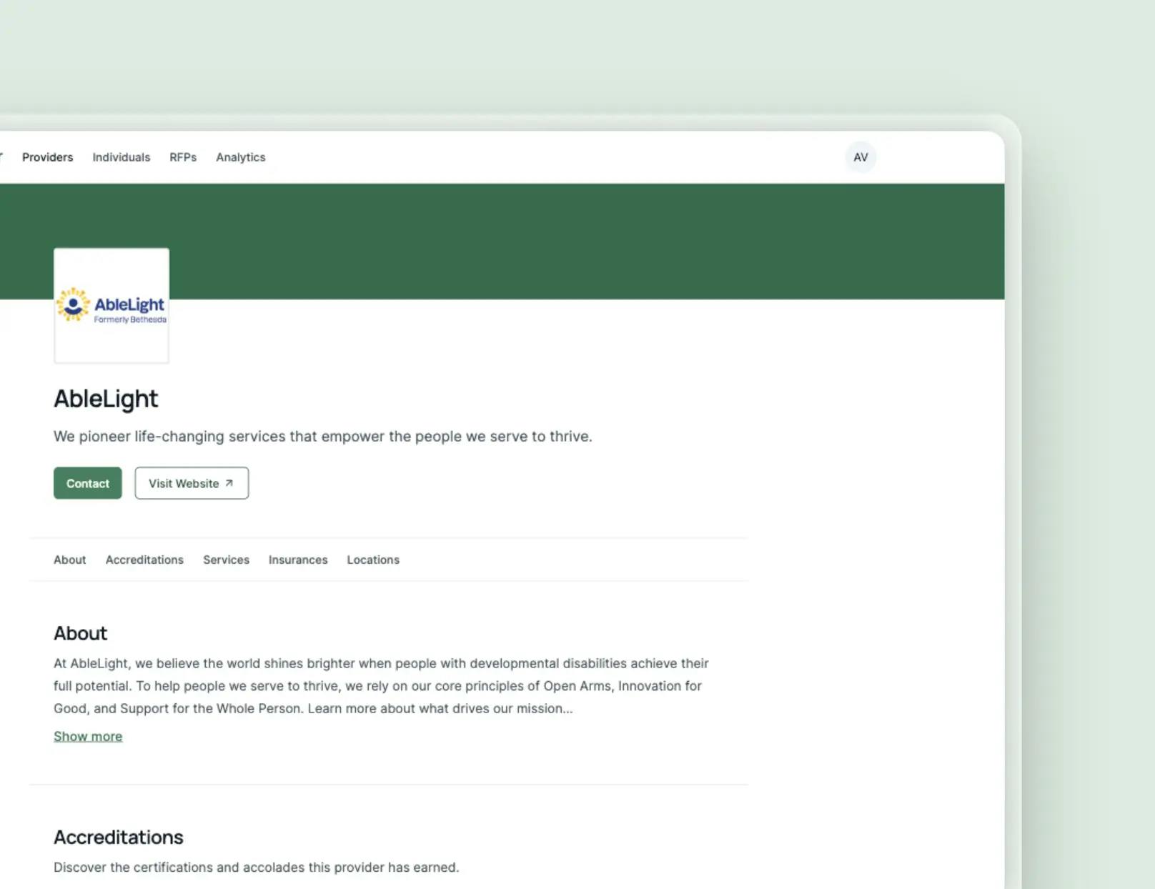 A screenshot of a provider's profile on Wayfinder's directory, set against a light green background.